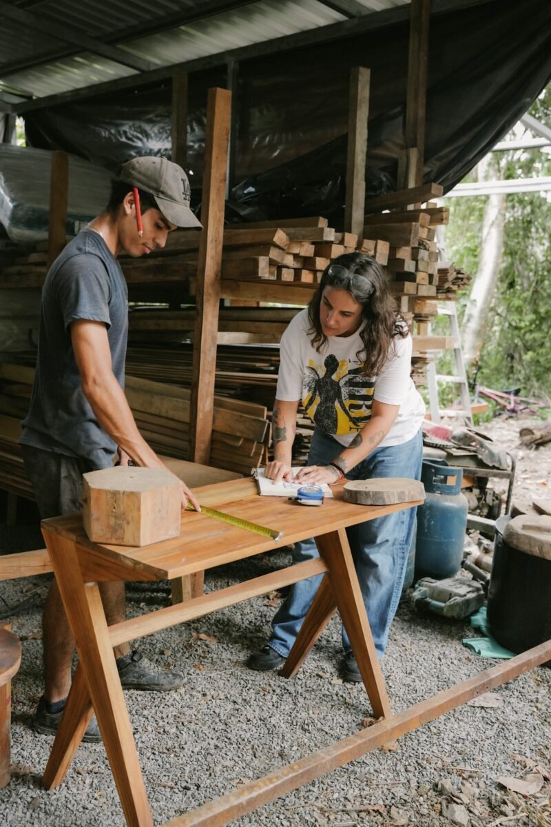 Maker sanding wood at the carpinteria